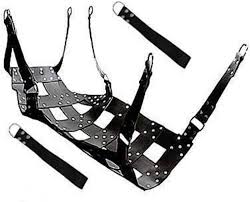 A bunch of leather straps tied together forming a sling. Like you could lie in it.