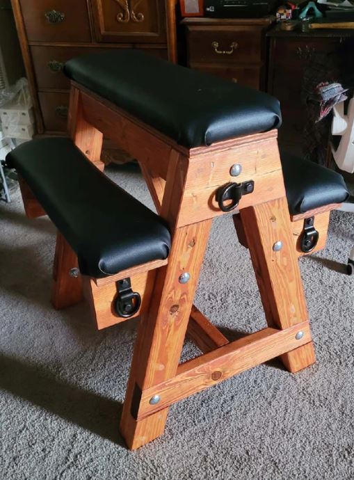 A small padded picnic table padded