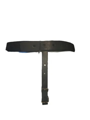 leather strap going up his backside to a belt