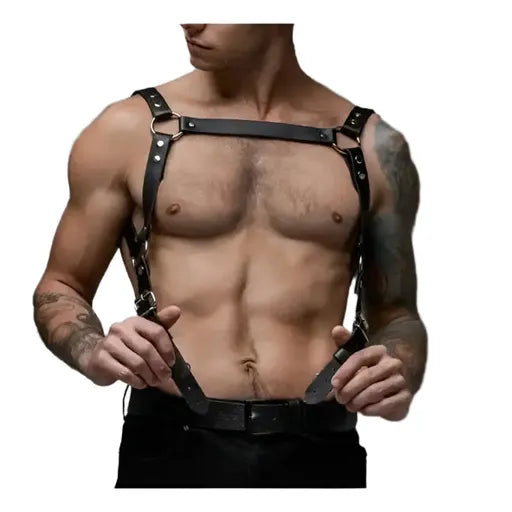 Man wearing a black leather harness with suspenders built in