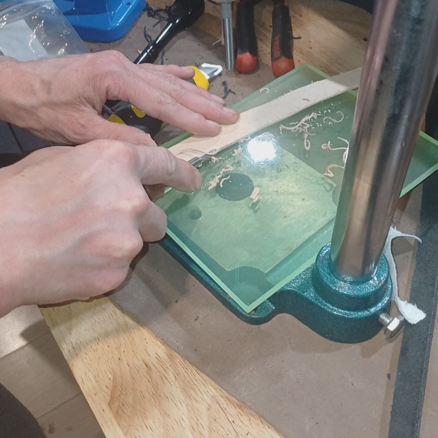 Load video: A gentleman is edging lether that is being prepped for dying. The edges are to sharp and will cause abrasions on the skin if not trimmed.